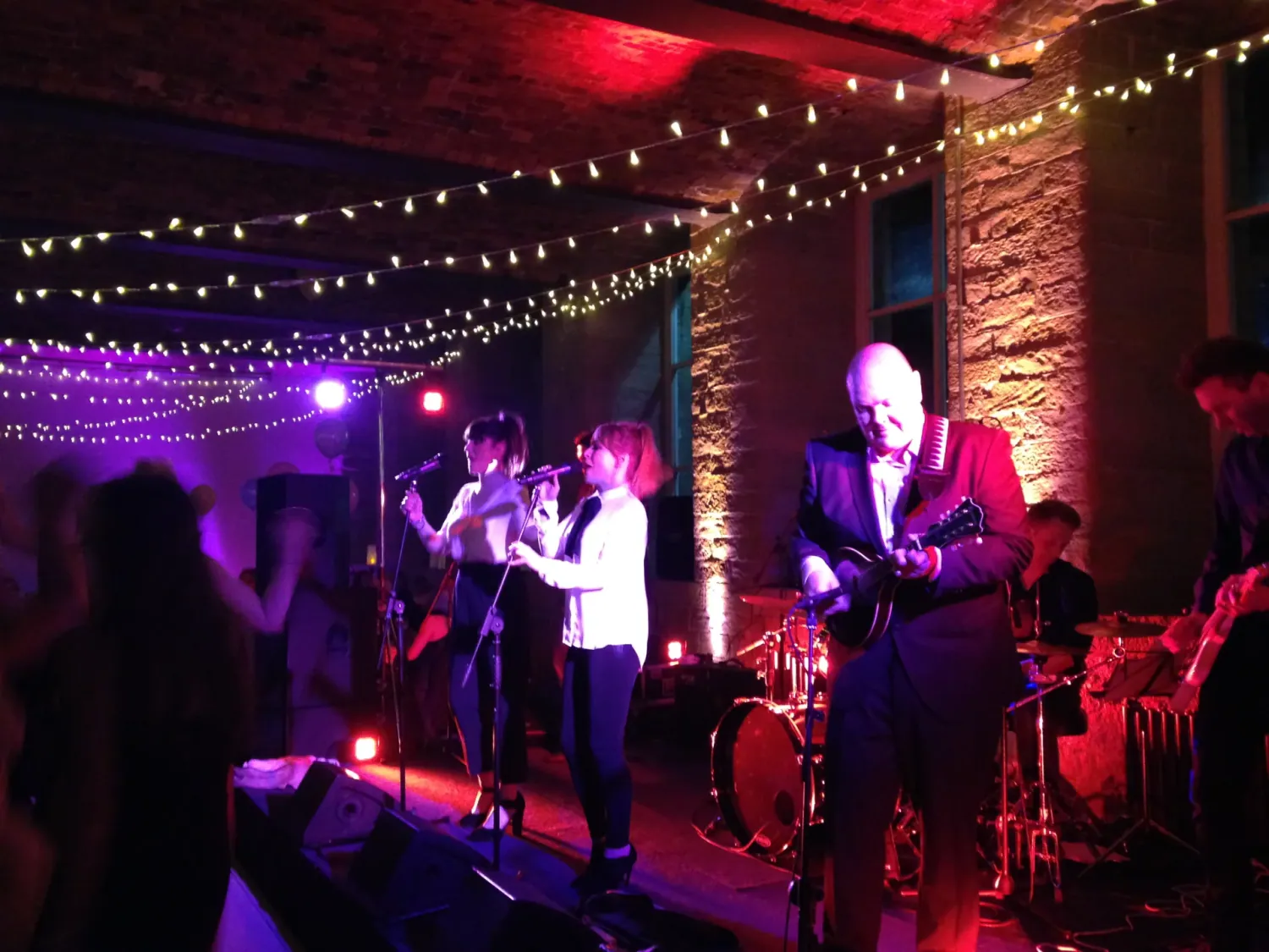 A live band on stage at The Arches